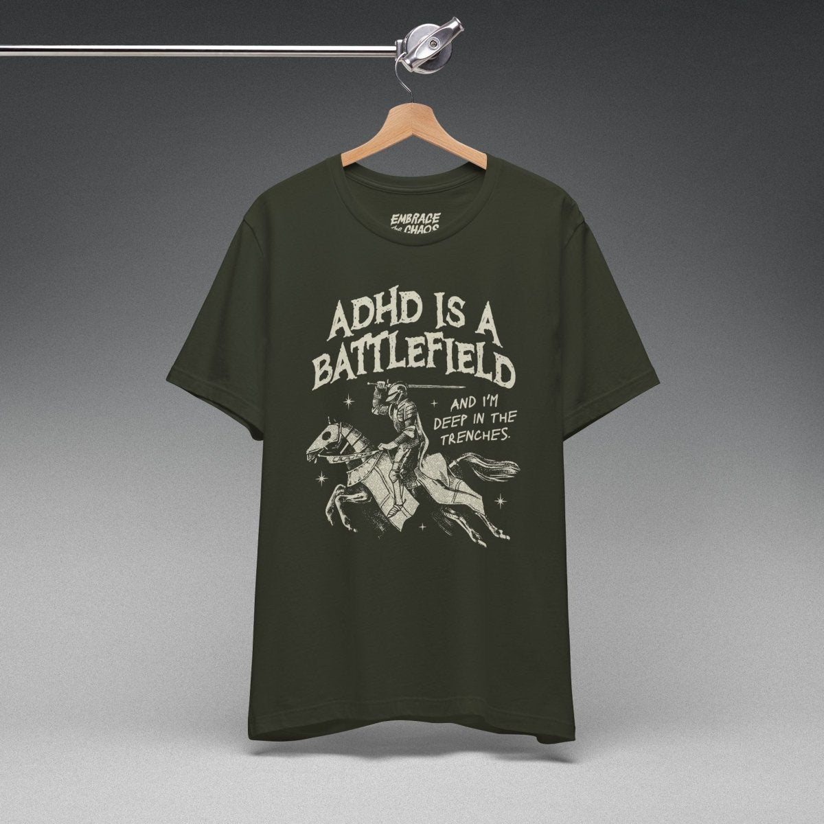 ADHD IS A BATTLEFIELD T-SHIRT XS Dark Olive - Embrace The Chaos mental health humor apparel