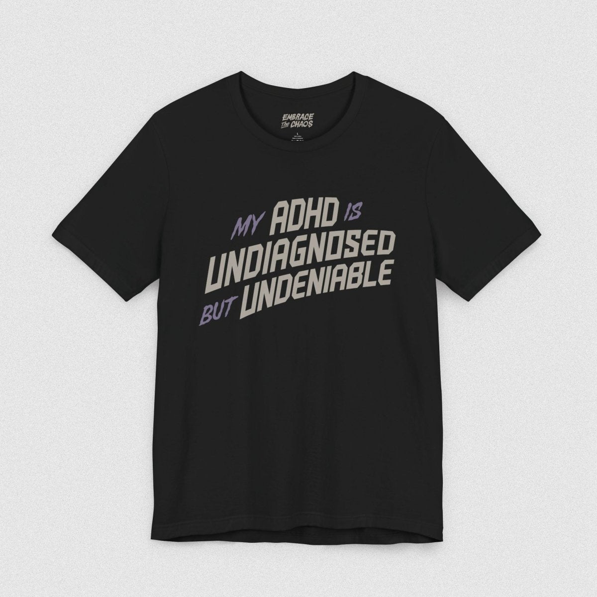 ADHD UNDIAGNOSED BUT UNDENIABLE TEE XS Black - Embrace The Chaos mental health humor apparel