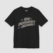 ADHD UNDIAGNOSED BUT UNDENIABLE TEE XS Black - Embrace The Chaos mental health humor apparel
