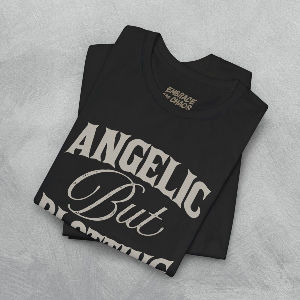 ANGELIC BUT PLOTTING TEE XS Navy - Embrace The Chaos mental health humor apparel
