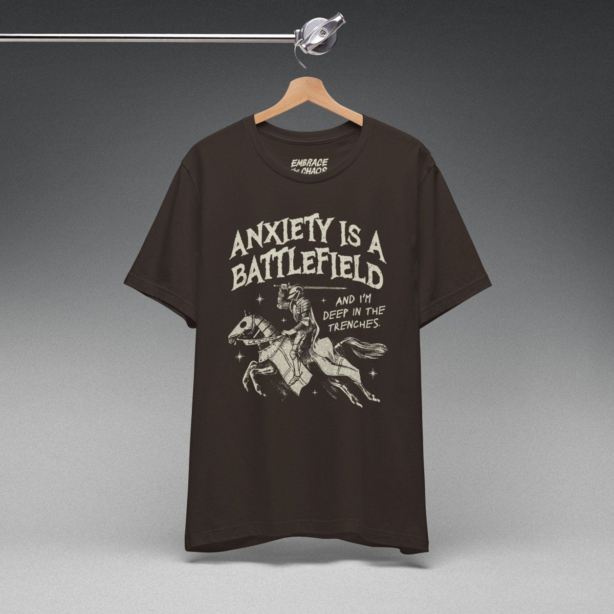 ANXIETY IS A BATTLEFIELD T-SHIRT XS Brown - Embrace The Chaos mental health humor apparel