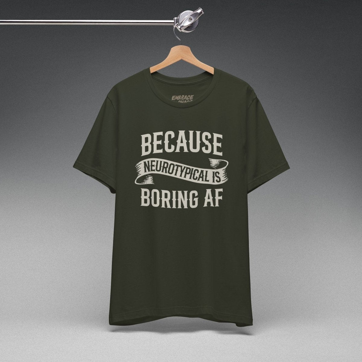 BCS NEUROTYPICAL IS BORING AF TEE XS Dark Olive - Embrace The Chaos mental health humor apparel