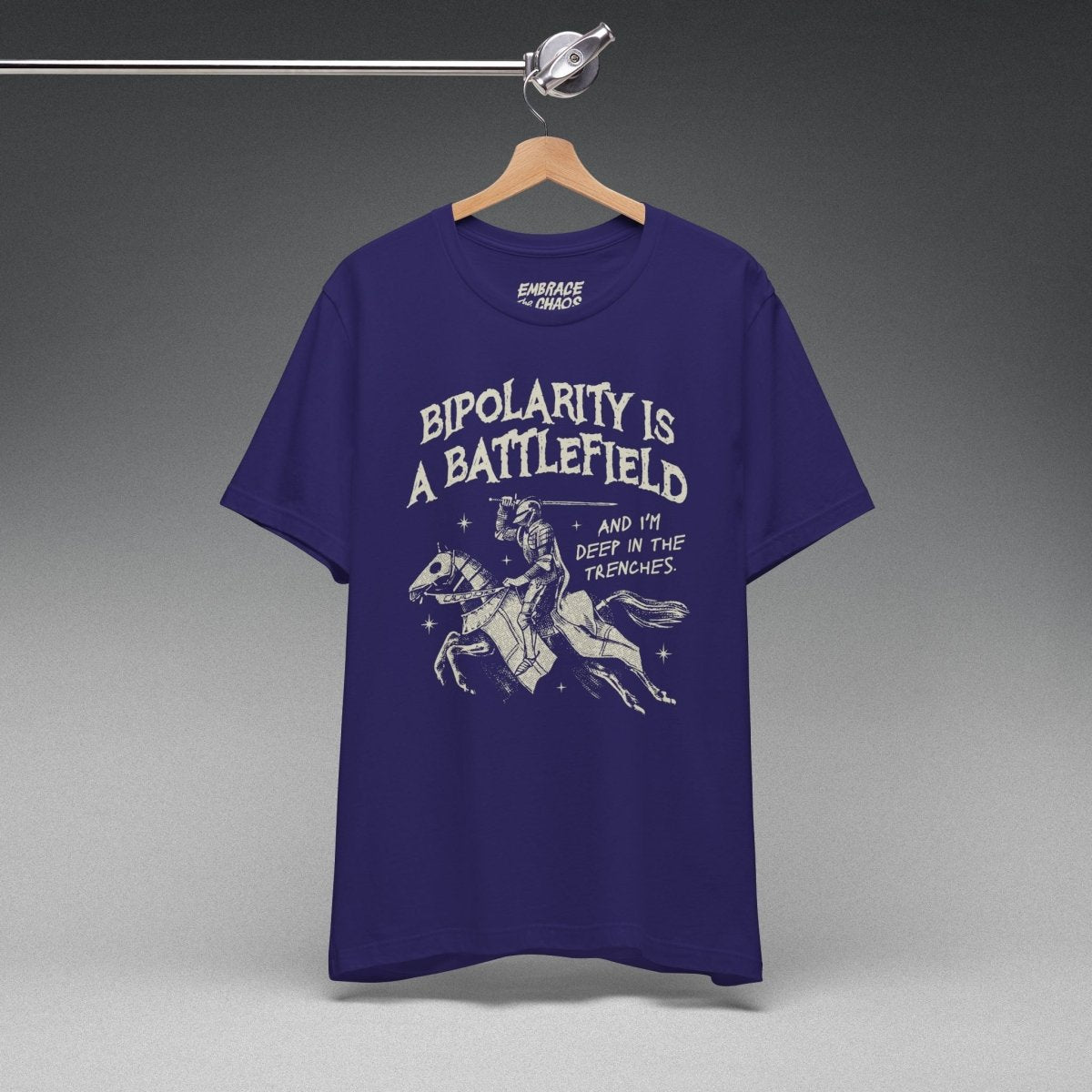 BIPOLARITY IS A BATTLEFIELD TEE XS Team Navy - Embrace The Chaos mental health humor apparel