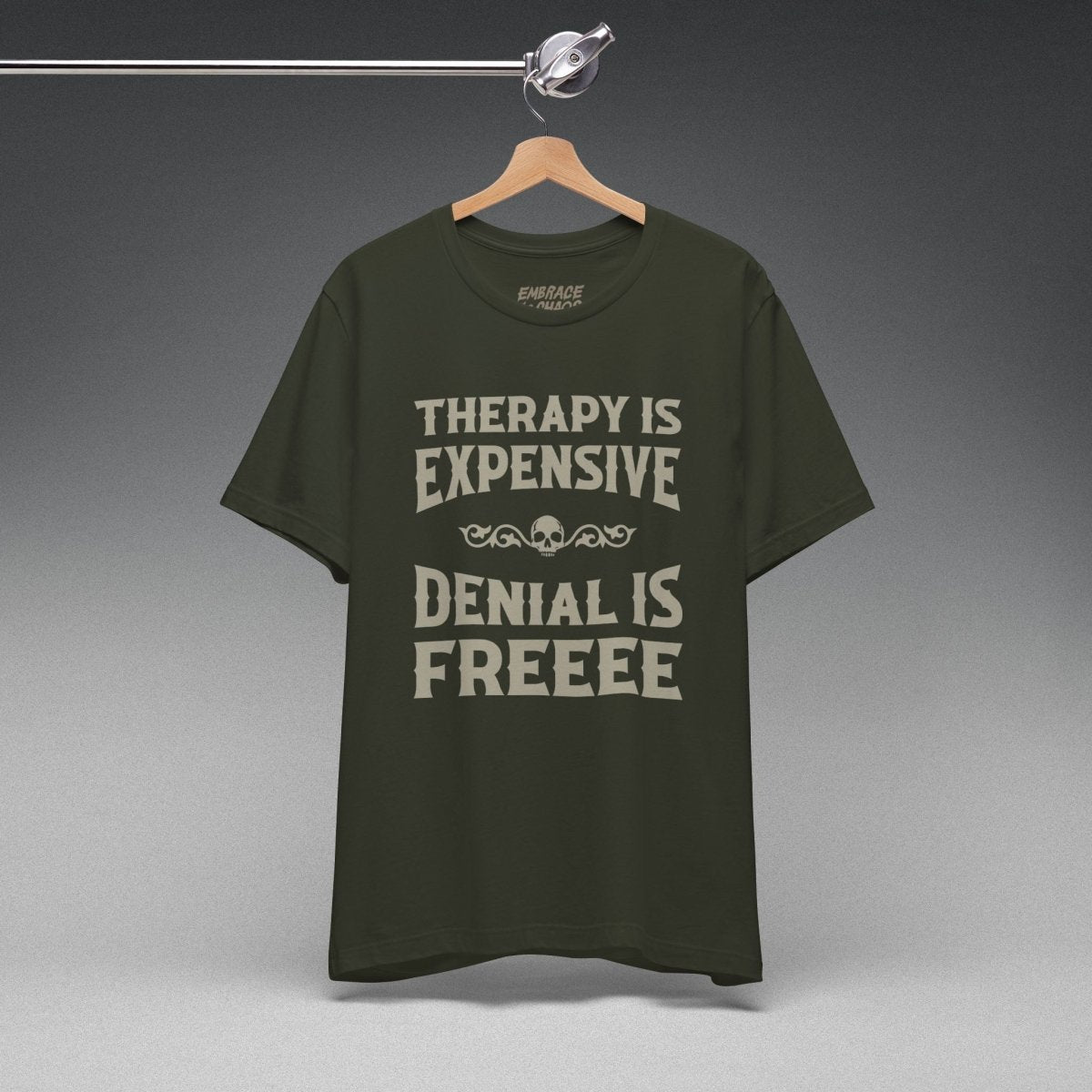 DENIAL IS FREEEE T-SHIRT XS Dark Olive - Embrace The Chaos mental health humor apparel