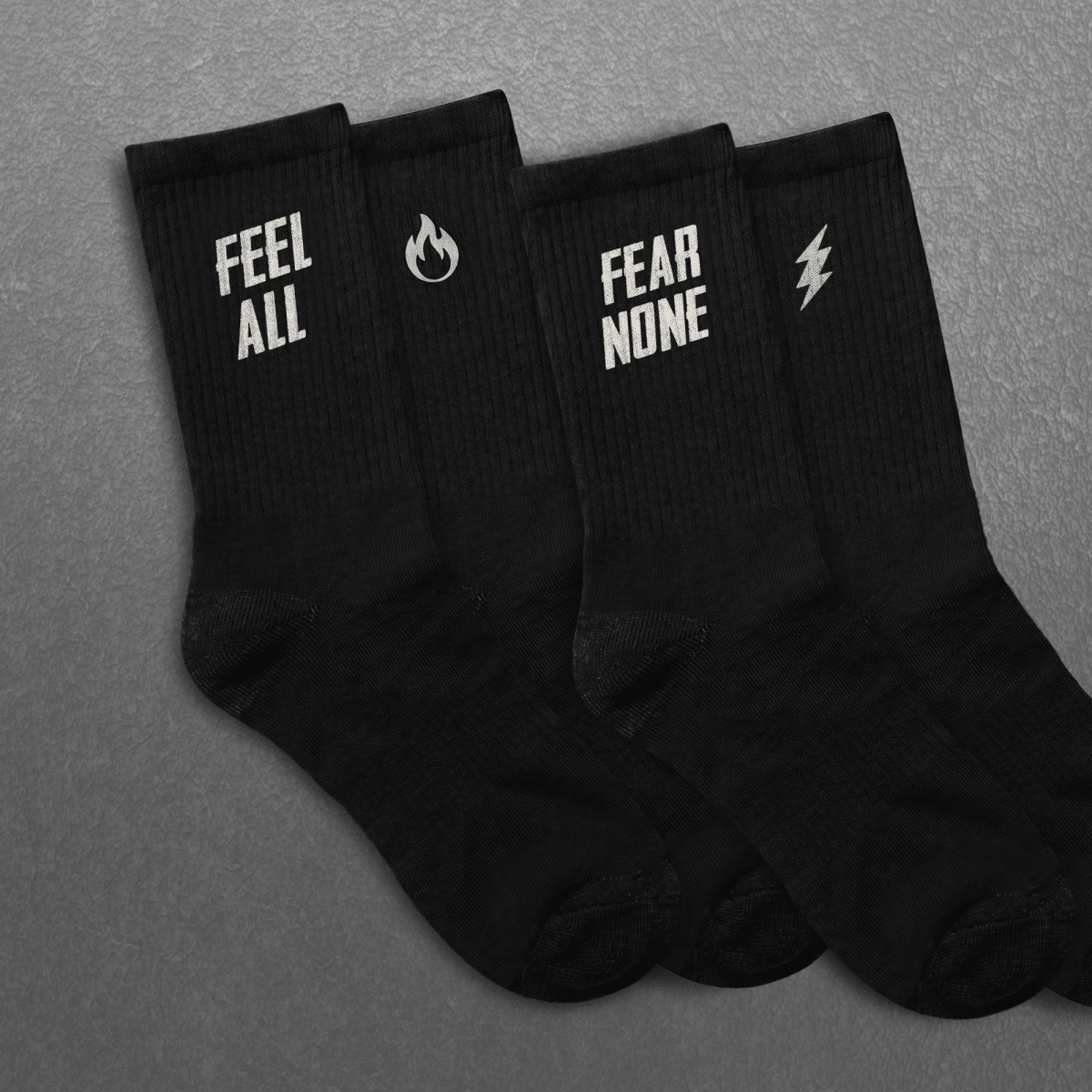 FEEL ALL. FEAR NONE. UNISEX SOCKS One size White - Embrace The Chaos mental health humor apparel