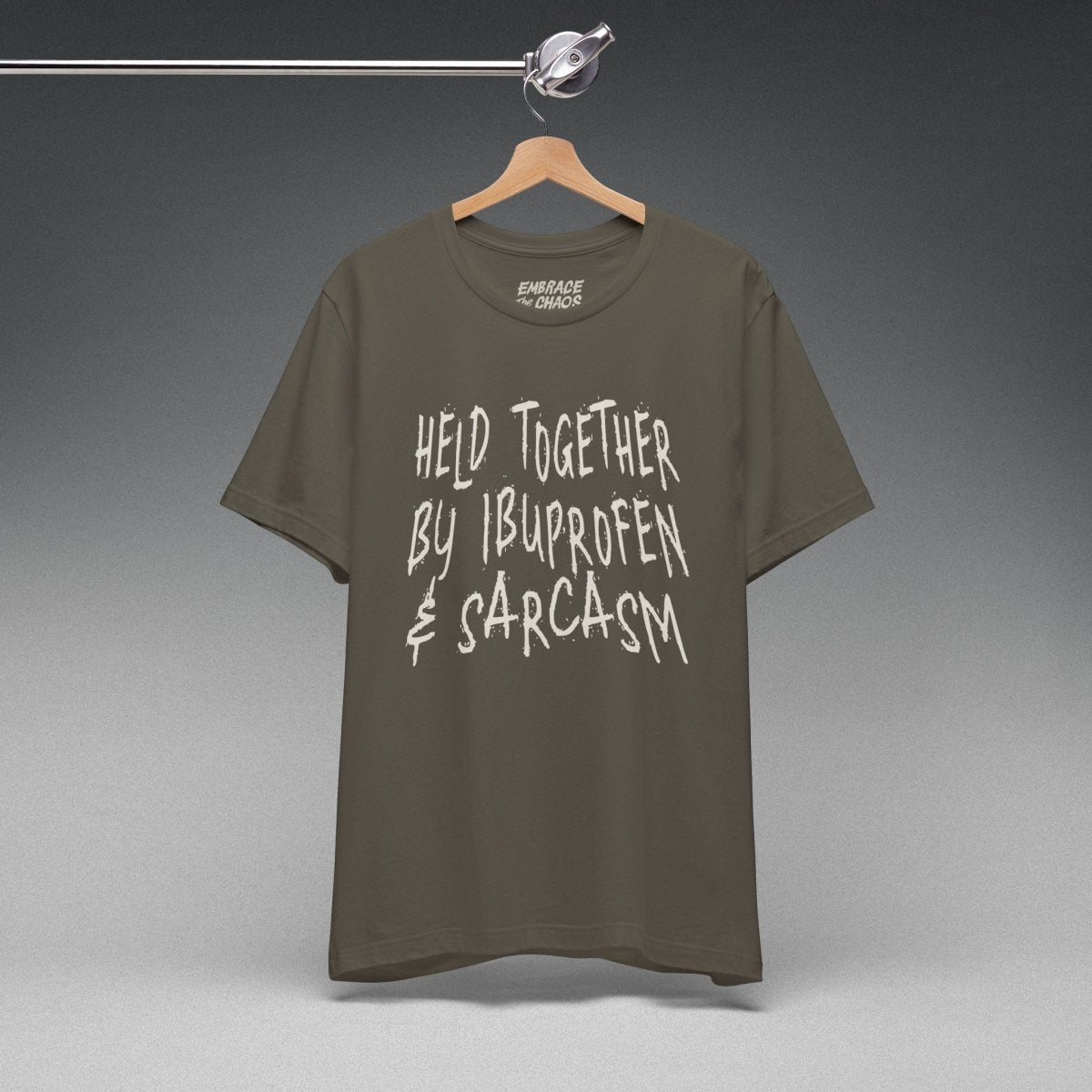 HELD TOGETHER BY IBUPROFEN & SARCASM TEE XS Army - Embrace The Chaos mental health humor apparel