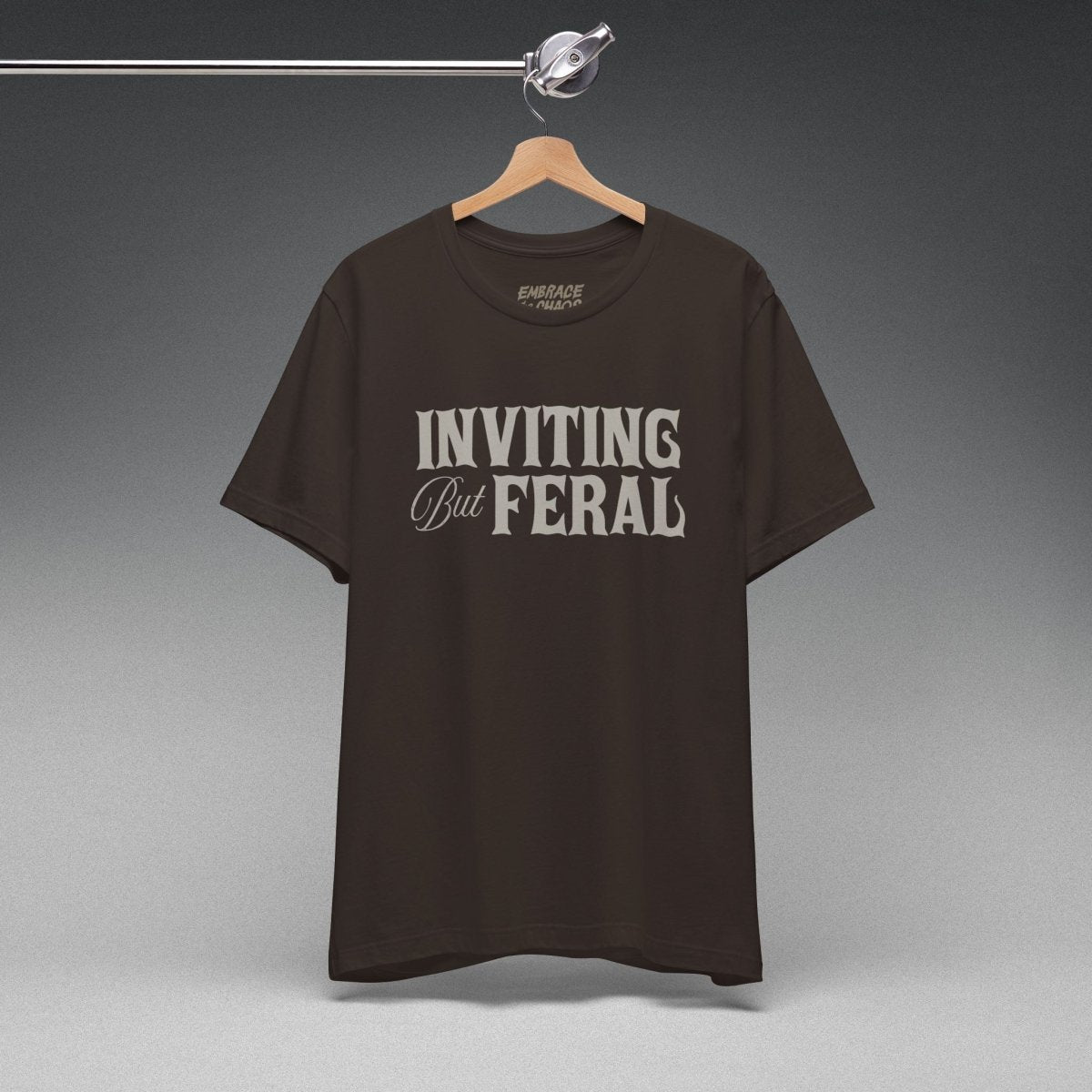 INVITING BUT FERAL TEE XS Brown - Embrace The Chaos mental health humor apparel