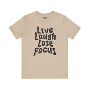 LIVE LAUGH LOSE FOCUS TEE XS Tan - Embrace The Chaos mental health humor apparel
