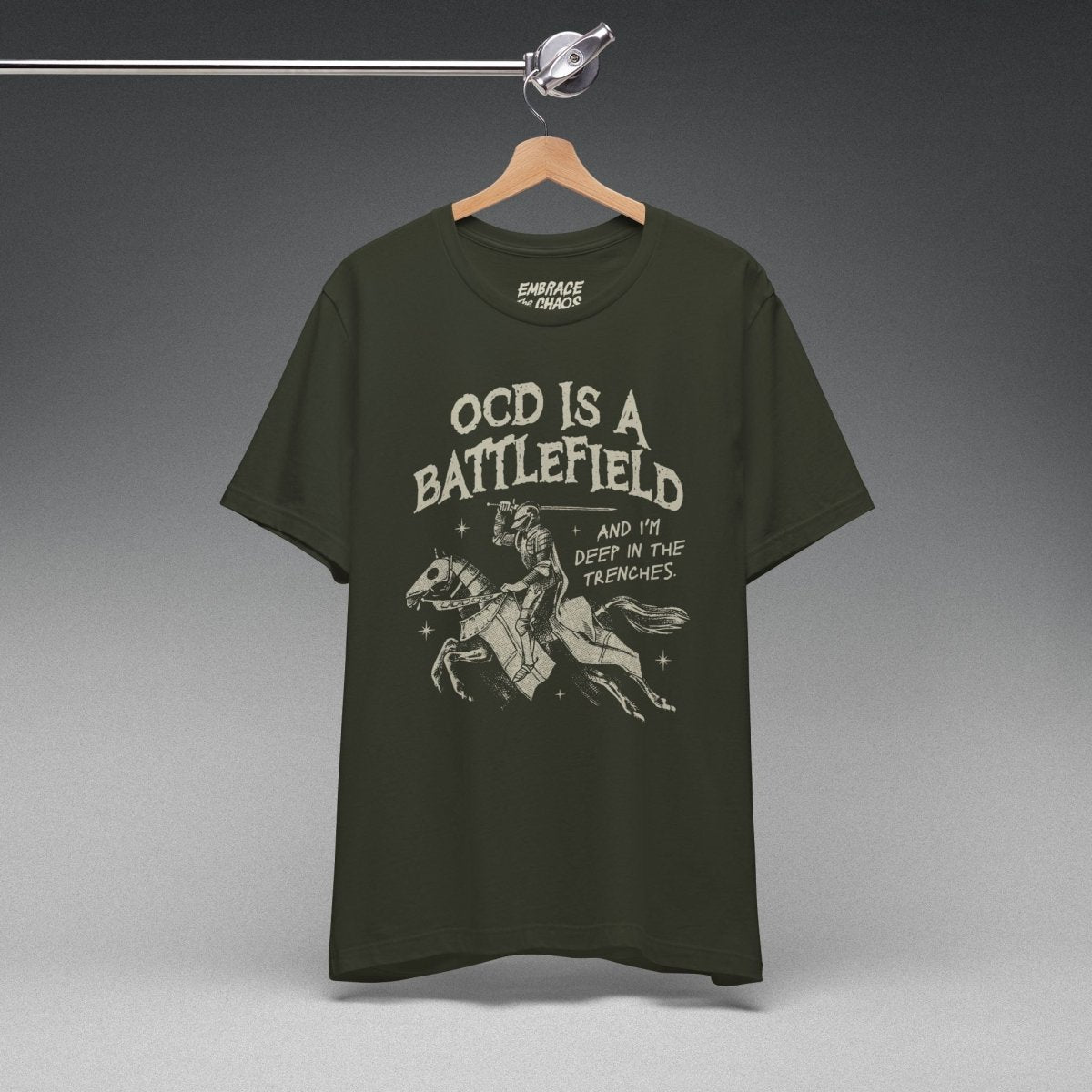OCD IS A BATTLEFIELD T-SHIRT XS Dark Olive - Embrace The Chaos mental health humor apparel