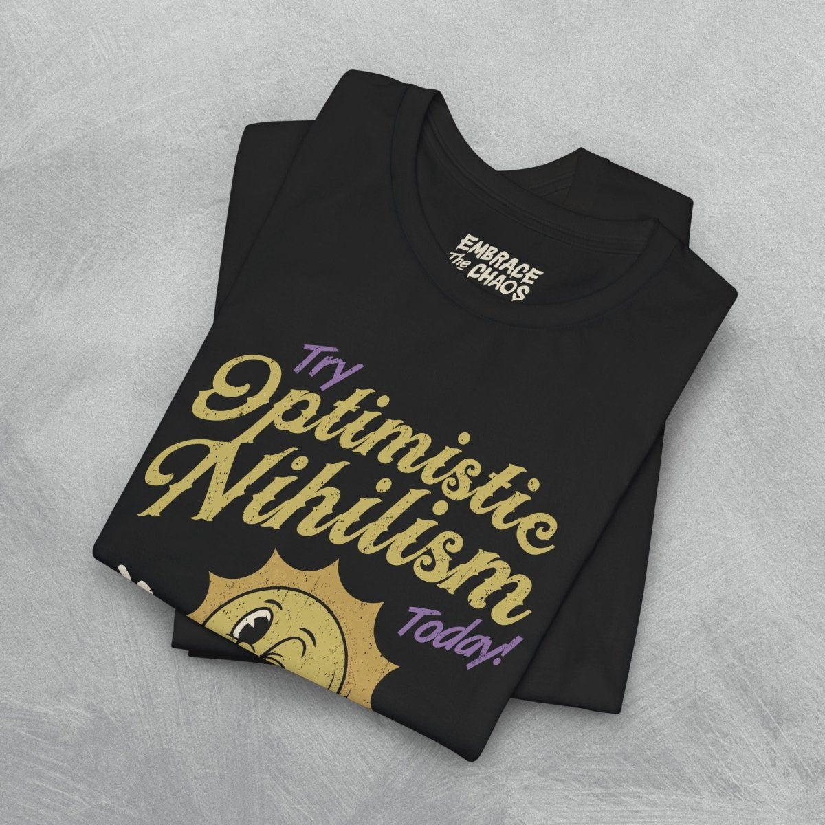 OPTIMISTIC NIHILISM T-SHIRT XS Team Purple - Embrace The Chaos mental health humor apparel