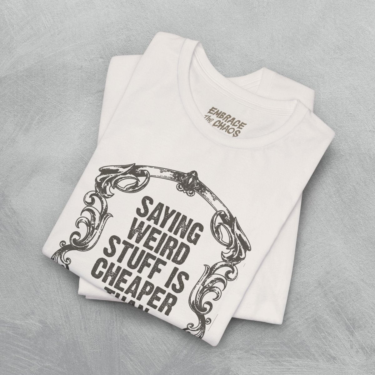 SAYING WEIRD STUFF IS CHEAPER TEE S White - Embrace The Chaos mental health humor apparel