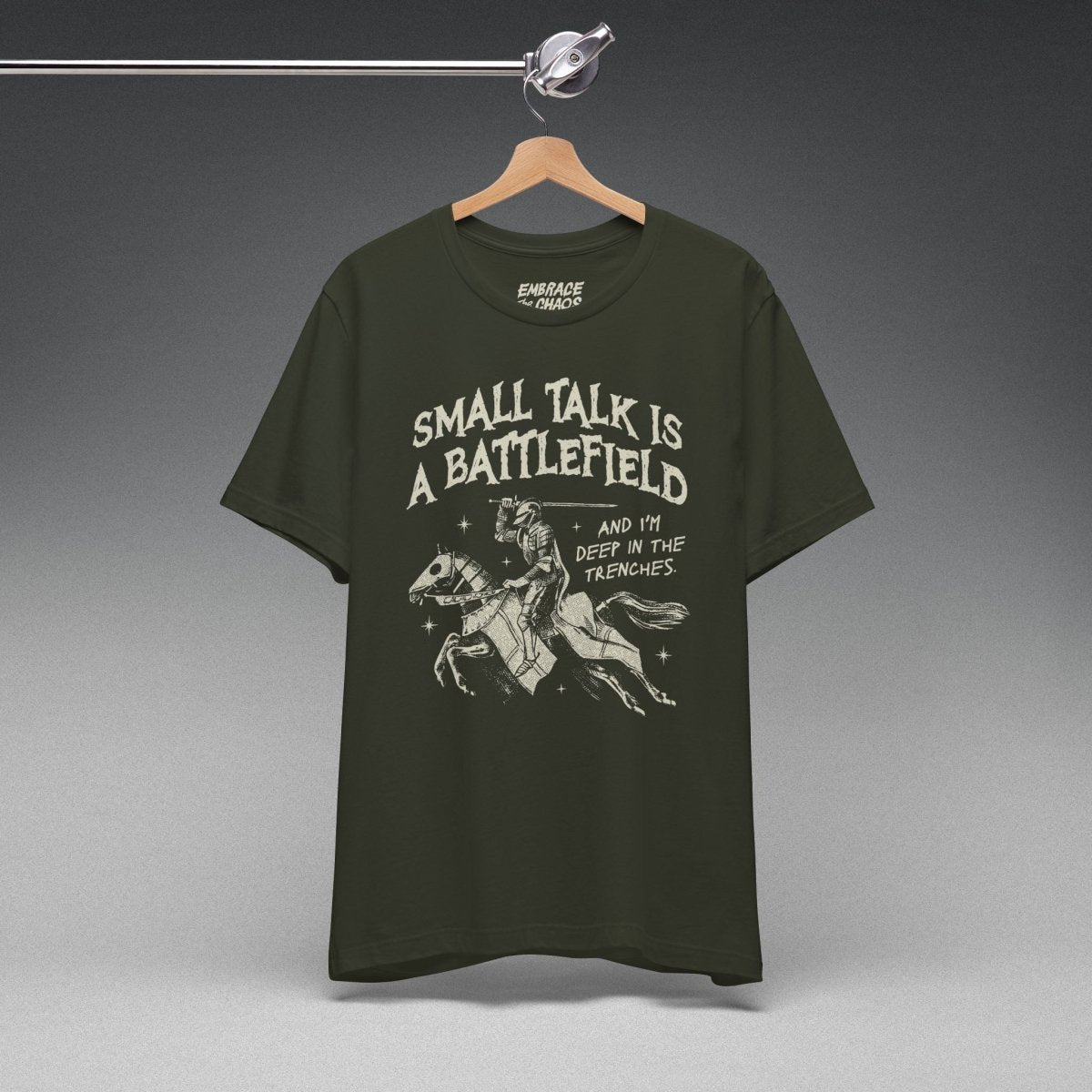 SMALL TALK IS A BATTLEFIELD TEE XS Dark Olive - Embrace The Chaos mental health humor apparel