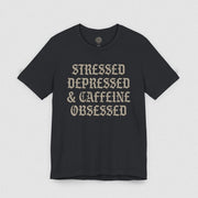 STRESSED DEPRESSED & CAFFEINE OBSESSED TEE XS Vintage Black - Embrace The Chaos mental health humor apparel