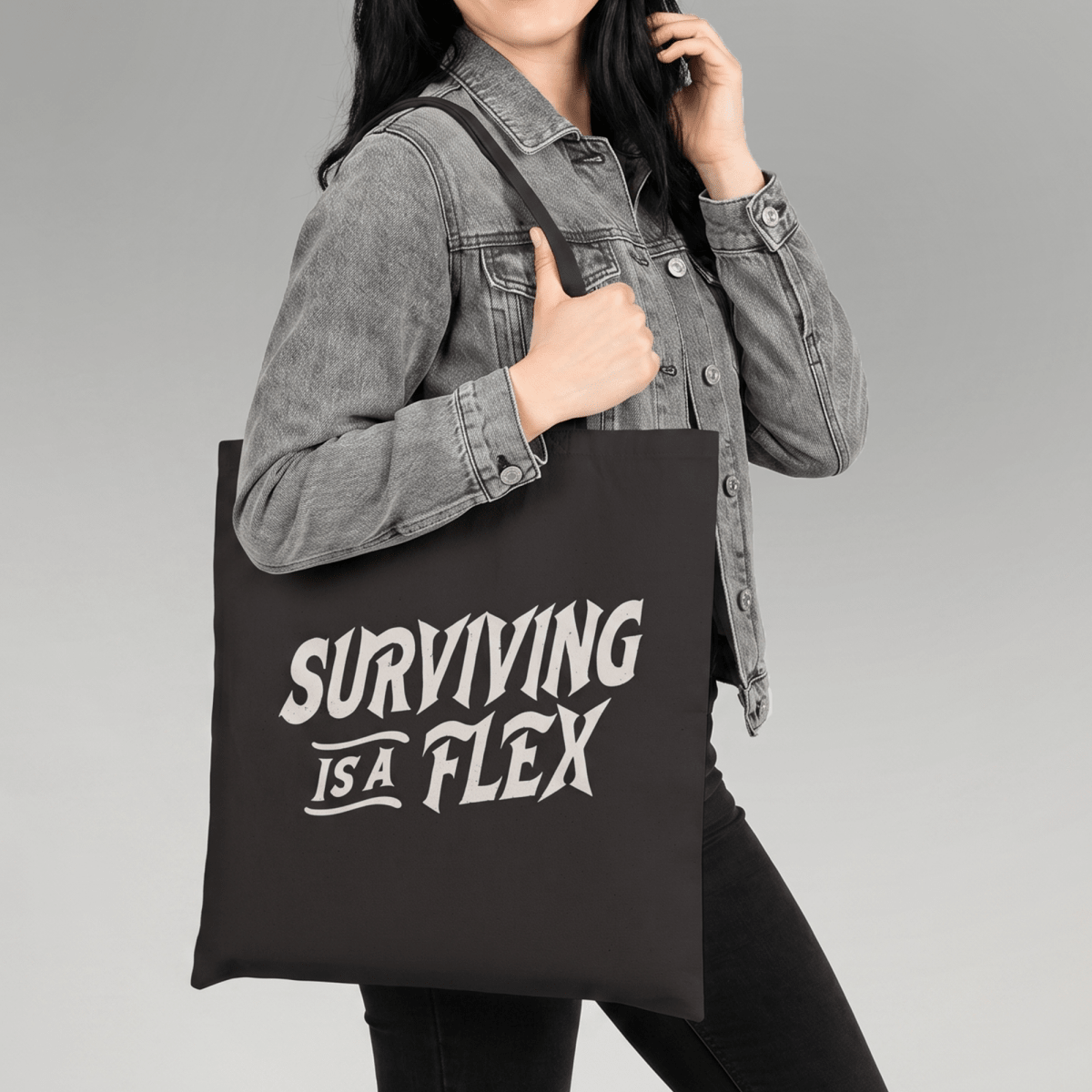 SURVIVING IS A FLEX TOTE BAG Black 15" x 16" - Embrace The Chaos mental health humor apparel