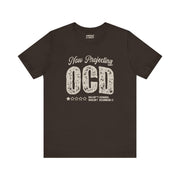 WOULDN'T RECOMMEND IT TEE XS Brown - Embrace The Chaos mental health humor apparel